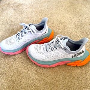 White Hokas with multicolor sole